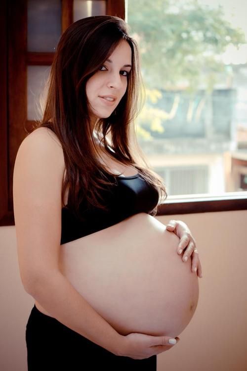 Sexy pregnant girl with