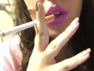 Beautiful lipstick nails smoking close