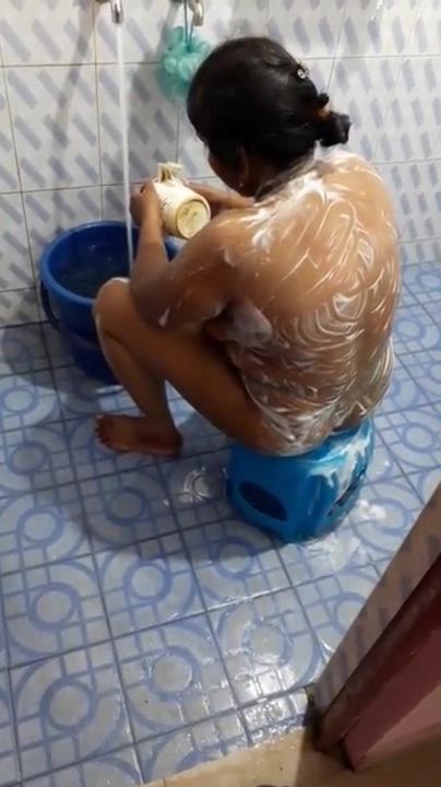 Indian aunty nude bathing
